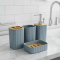 GoHooked grey ribbed bathroom accessories set with soap dispenser, toothbrush holder, tumbler, and soap dish.