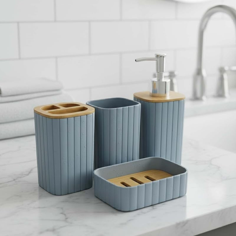 GoHooked grey ribbed bathroom accessories set with soap dispenser, toothbrush holder, tumbler, and soap dish.