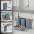 Go Hooked grey ribbed bathroom accessories set with soap dispenser, toothbrush holder, tumbler, and soap dish.