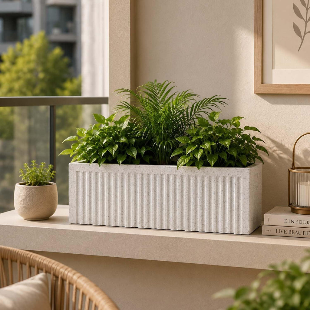 GoHooked grey ribbed polymer rectangular planter with lush green plants, perfect for indoor or outdoor spaces.