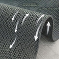 GoHooked grey anti-skid rubber bathroom mat with a flexible open mesh design for quick water drainage.