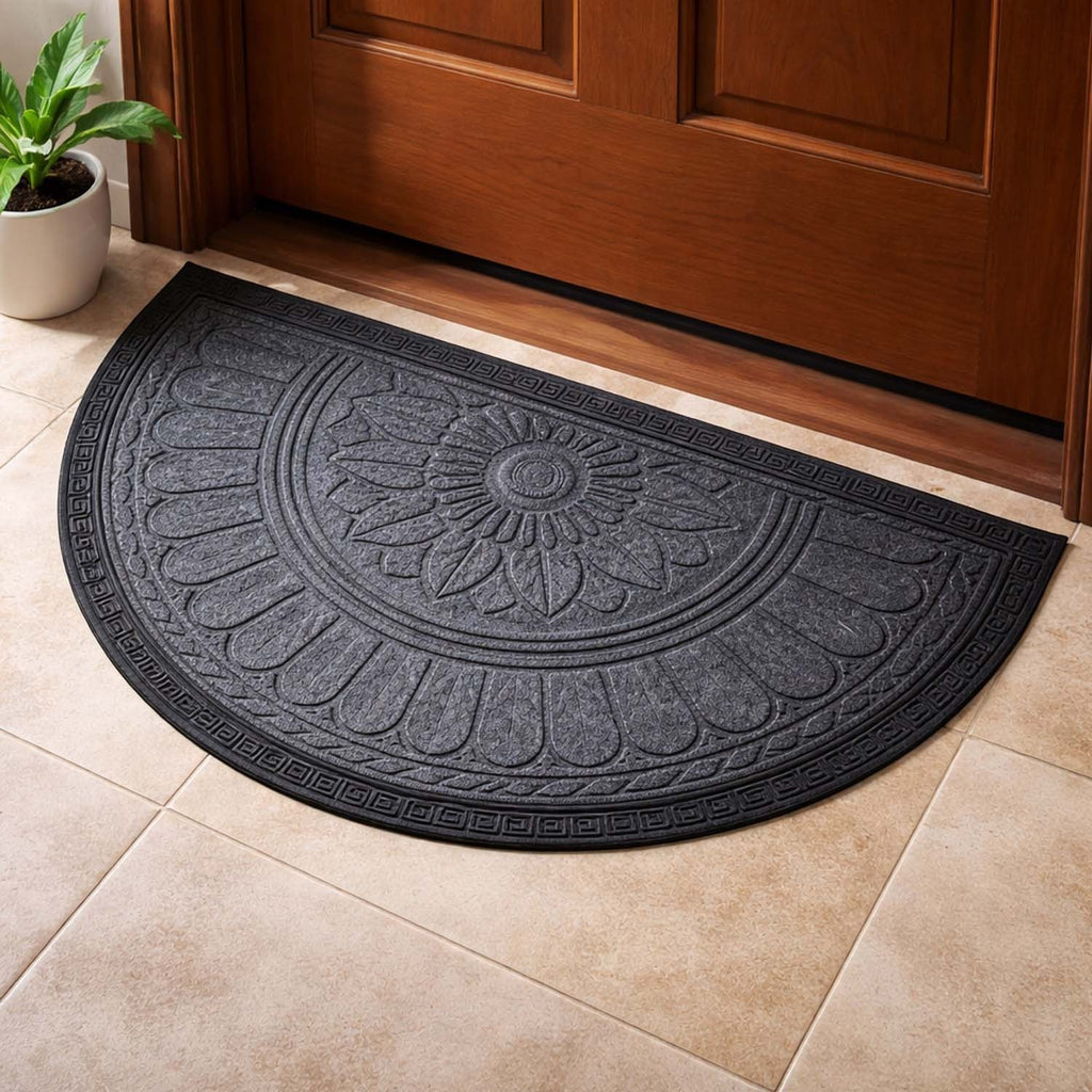 GoHooked grey rubber half circle door mat with embossed lotus floral pattern and anti-slip border at a doorway.