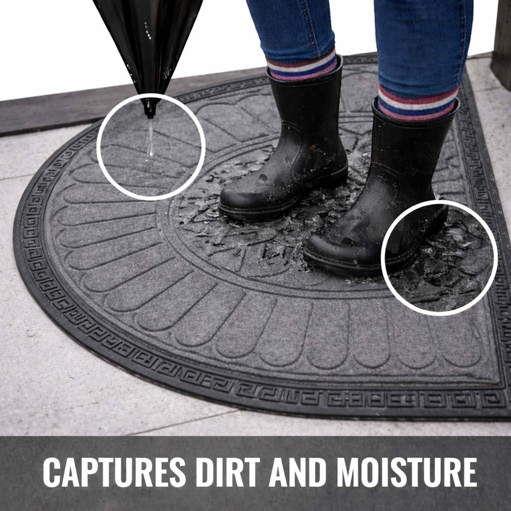GoHooked grey rubber half circle door mat with anti-slip base, capturing water and dirt under black rain boots.