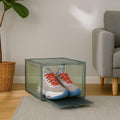 GoHooked grey acrylic sneaker display box with magnetic front door, holding a pair of grey and blue sneakers with red laces.