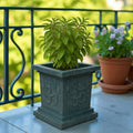 GoHooked grey square polymer Tulsi pot with Om and Swastik design, suitable for home temple and balcony decor.