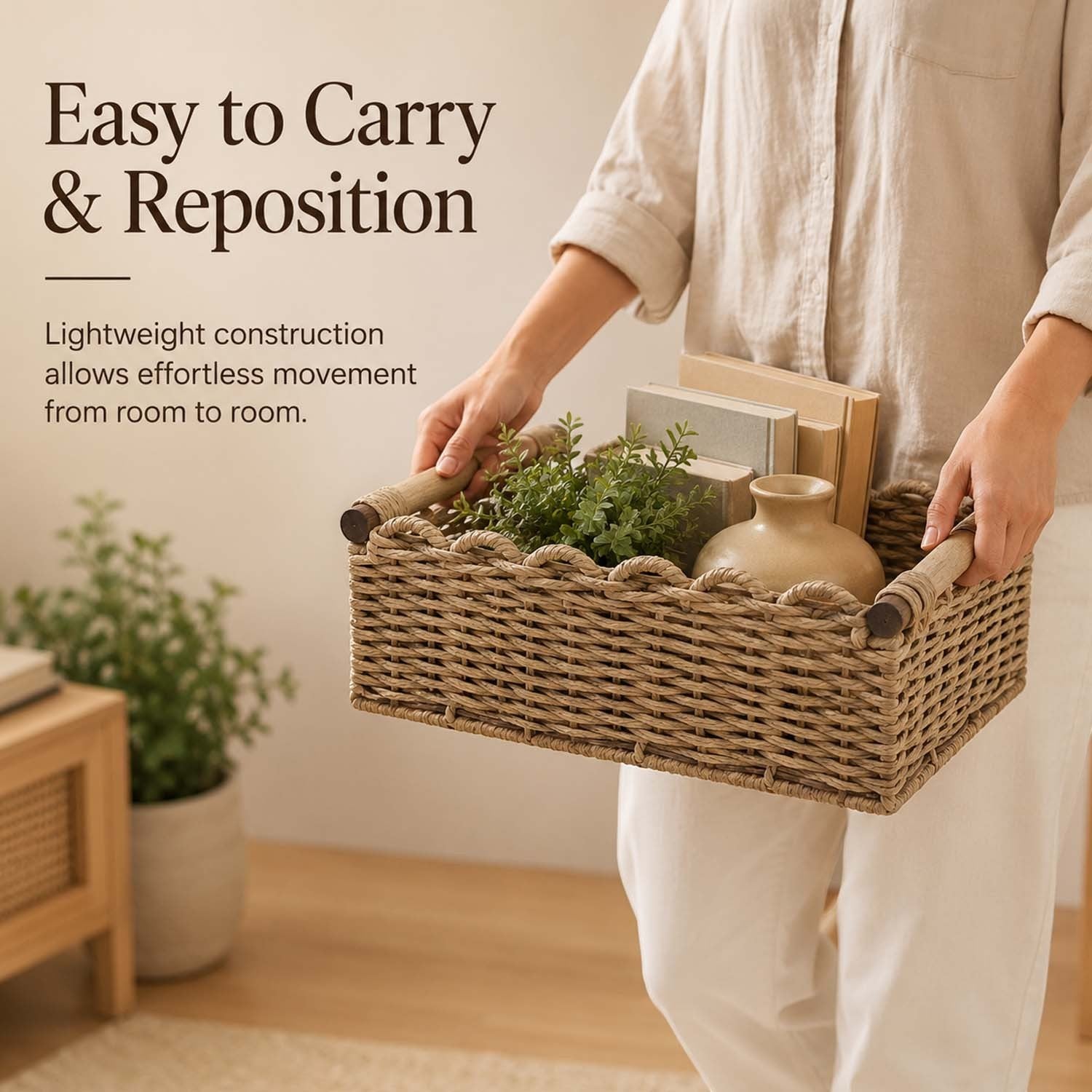 GoHooked handmade raffia storage basket with wooden handles held by a person, featuring a sturdy metal frame.