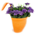 GoHooked orange plastic hanging planter with purple flowers and green leaves, embossed floral design.