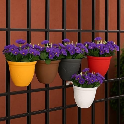 GoHooked multicolor set of 7 unbreakable plastic hanging planters with purple flowers on a black railing.
