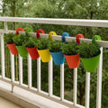 GoHooked multicolour virgin plastic hanging pots with green plants, set of 5, for balcony railings.