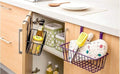 GoHooked black and purple metal hanging storage baskets on kitchen cabinet doors holding jars, utensils, and oven mitts.