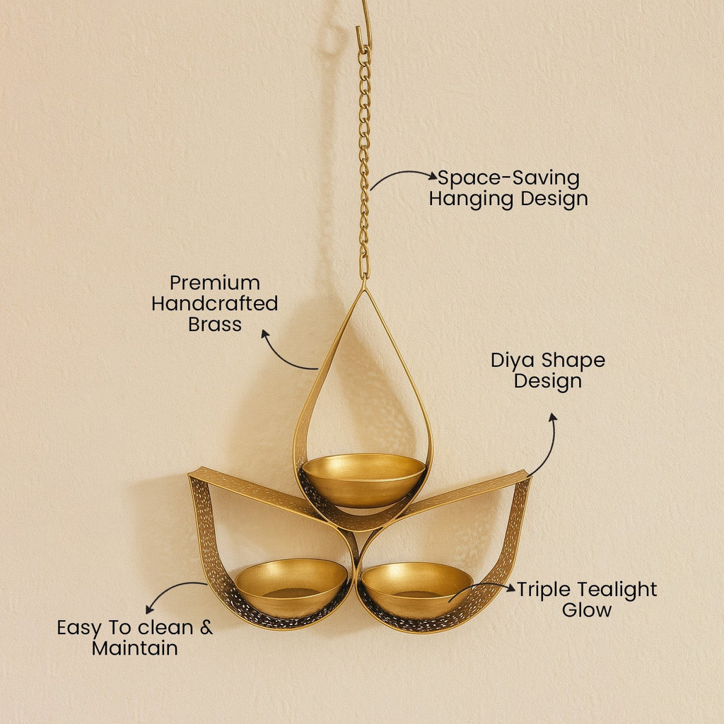 GoHooked golden brass hanging tealight candle holder with 3 cups in a tear drop design, perfect for ambient lighting.