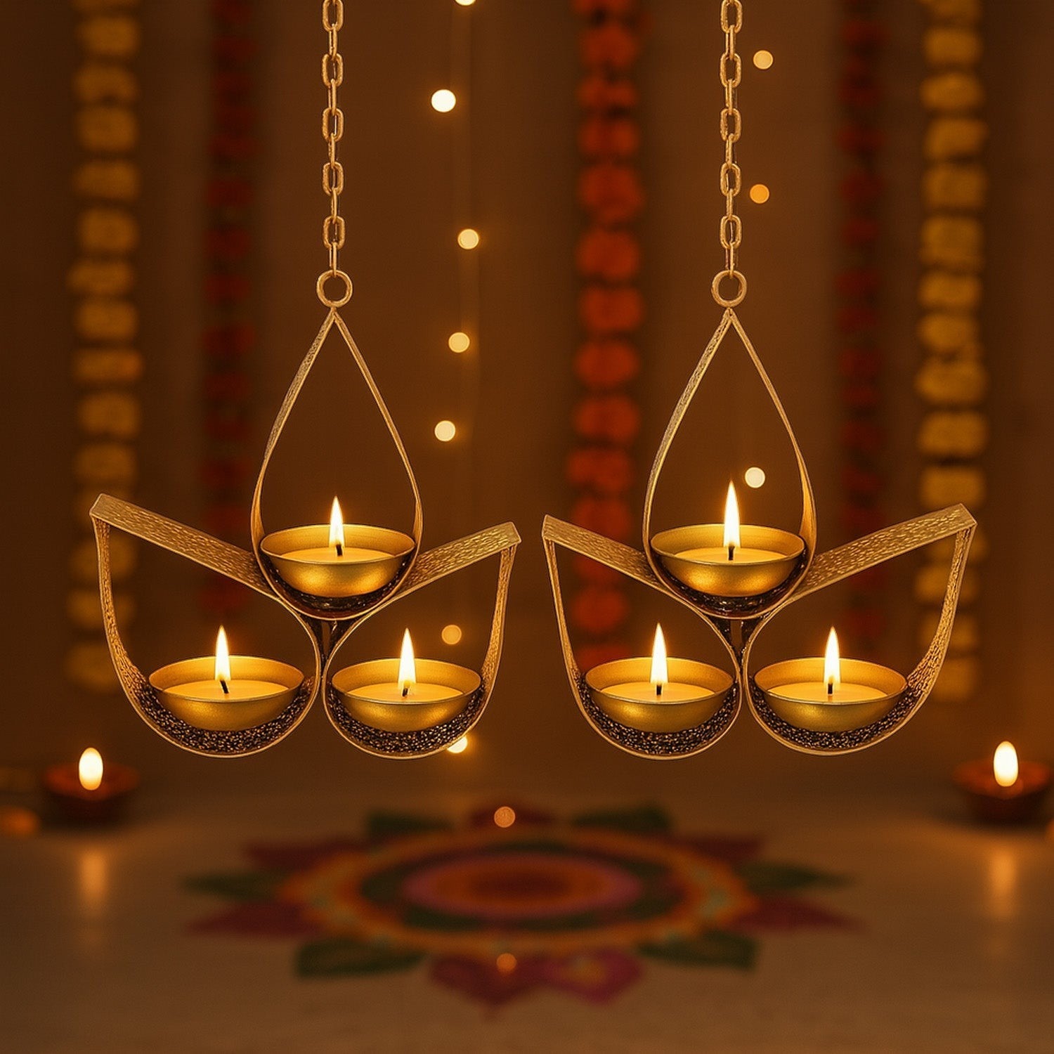 GoHooked golden metal hanging tealight candle holder with 3 trays, tear drop design, includes chain. Perfect for ambient lighting.
