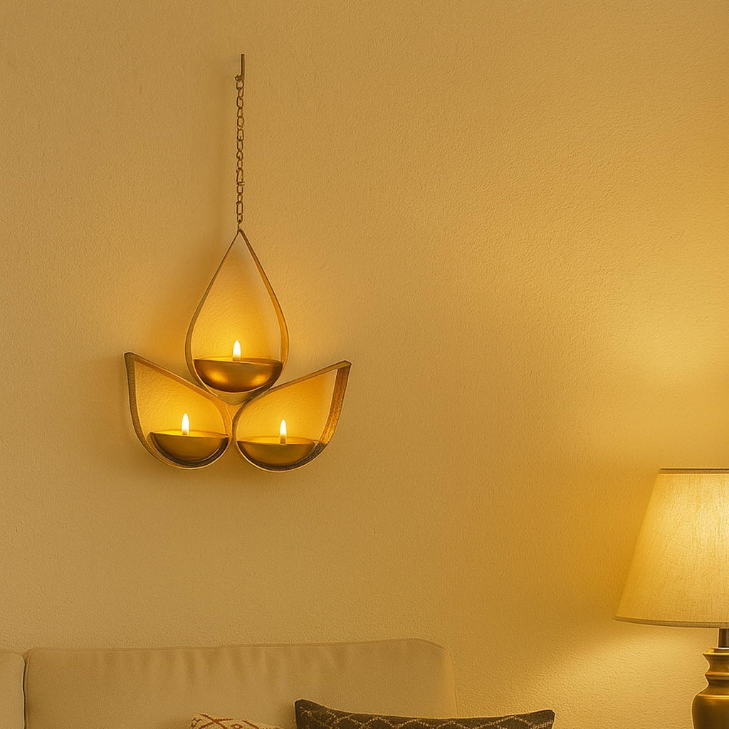 GoHooked hanging tealight candle holder with 3 tear drop shaped trays in matte gold finish, metal construction.