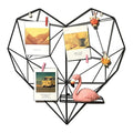 GoHooked black metal heart-shaped photo grid with shelf, displaying photos and a pink flamingo.