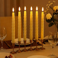 Go Hooked set of 6 ivory LED taper candles with spiral design, flickering flame, 26.7cm tall, battery operated.