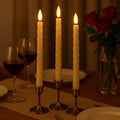 GoHooked Set of 3 ivory LED taper candles with spiral design, flickering flame, 26.7cm tall, battery operated.