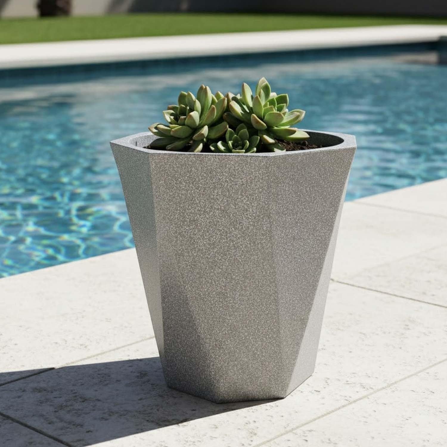 Go Hooked large 24-inch diamond-shaped polymer planter with a speckled stone white finish, holding a succulent plant by a pool.