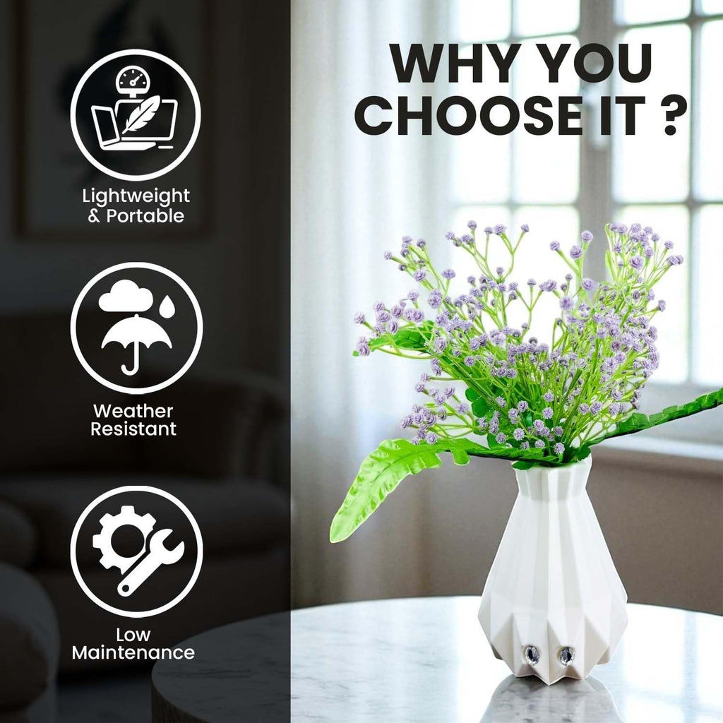 Go Hooked lavender baby's breath artificial flowers in a white geometric vase with green fern leaves. Realistic faux plant decor.