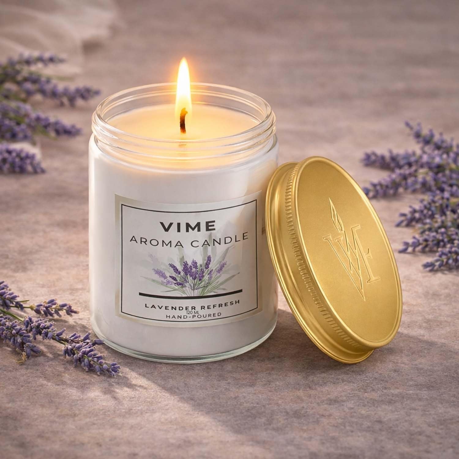 GoHooked white glass jar candle with "Lavender Refresh" scent, lit flame, and gold lid. Hand-poured wax.