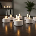 GoHooked white LED tealight candles, 12-piece set, flickering flame effect, perfect for romantic ambiance and decor.