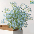 GoHooked light blue artificial baby's breath flowers with soft rubber heads and plastic stems, perfect for bouquets and arrangements.