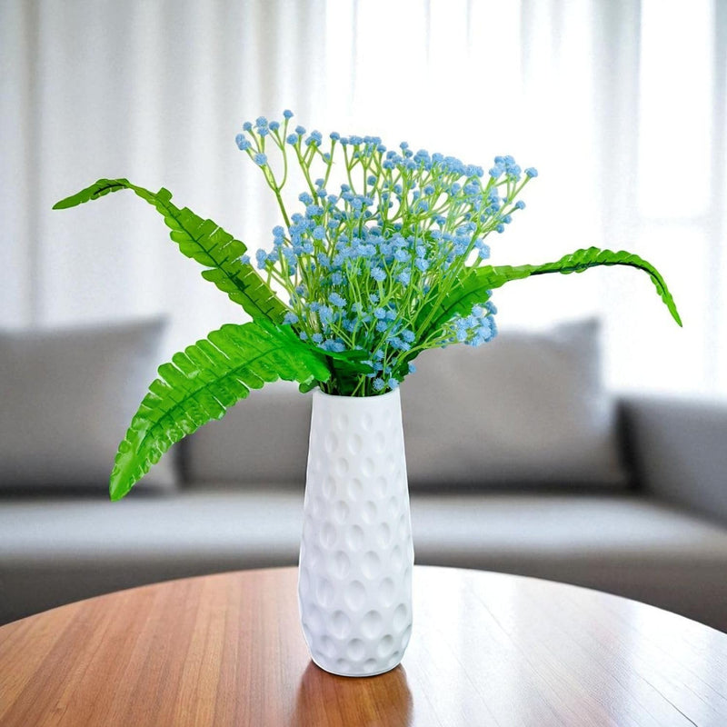GoHooked light blue artificial baby's breath flowers with realistic rubber flower heads and plastic stems in a white textured vase.
