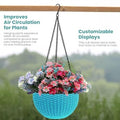 Go Hooked light blue plastic hanging flower pot with woven texture, filled with pink and purple flowers.