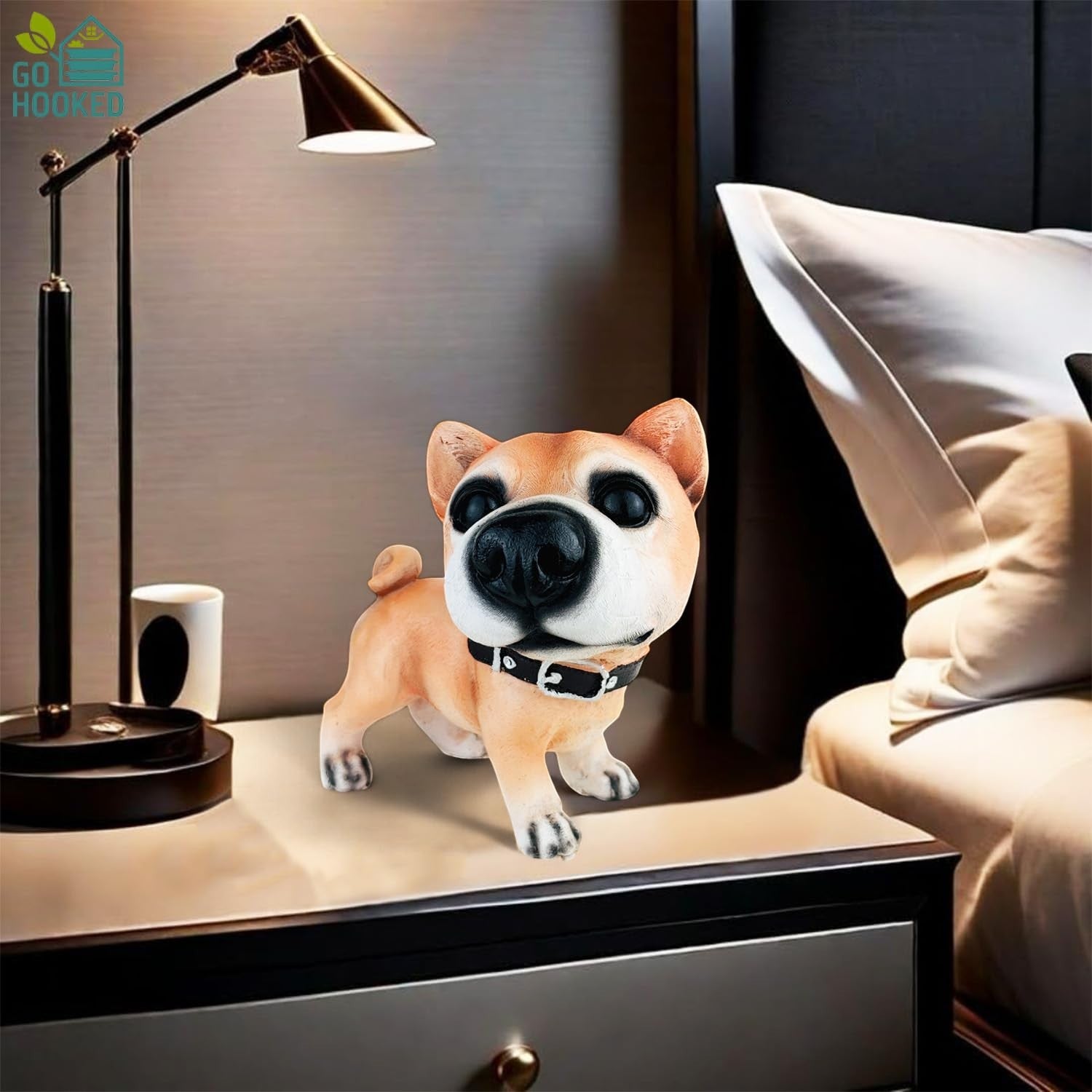 Go Hooked light brown polyresin dog figurine with black collar, realistic hand-painted details, on a nightstand.
