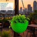 GoHooked light green plastic hanging planter with a diamond pattern and metal chain. Ideal for home garden or balcony.