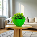GoHooked light green plastic hanging planter with diamond texture and metal chain, perfect for home garden or balcony.