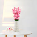 GoHooked light pink artificial flowers in a textured white ceramic vase. Realistic faux blossoms for home and office decor.