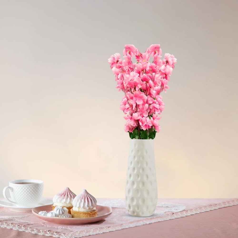 GoHooked light pink artificial flowers in a white textured vase, a decorative accent for home or office.