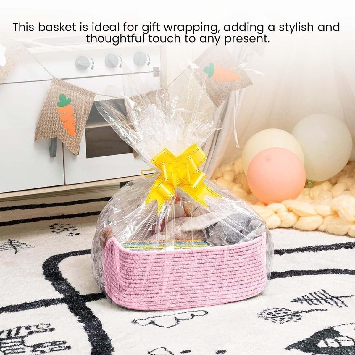 GoHooked light pink rectangular cotton rope storage basket with PU leather handles, filled with items and gift-wrapped.