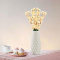 GoHooked light yellow artificial flowers in a textured white vase, perfect for home or office decor.