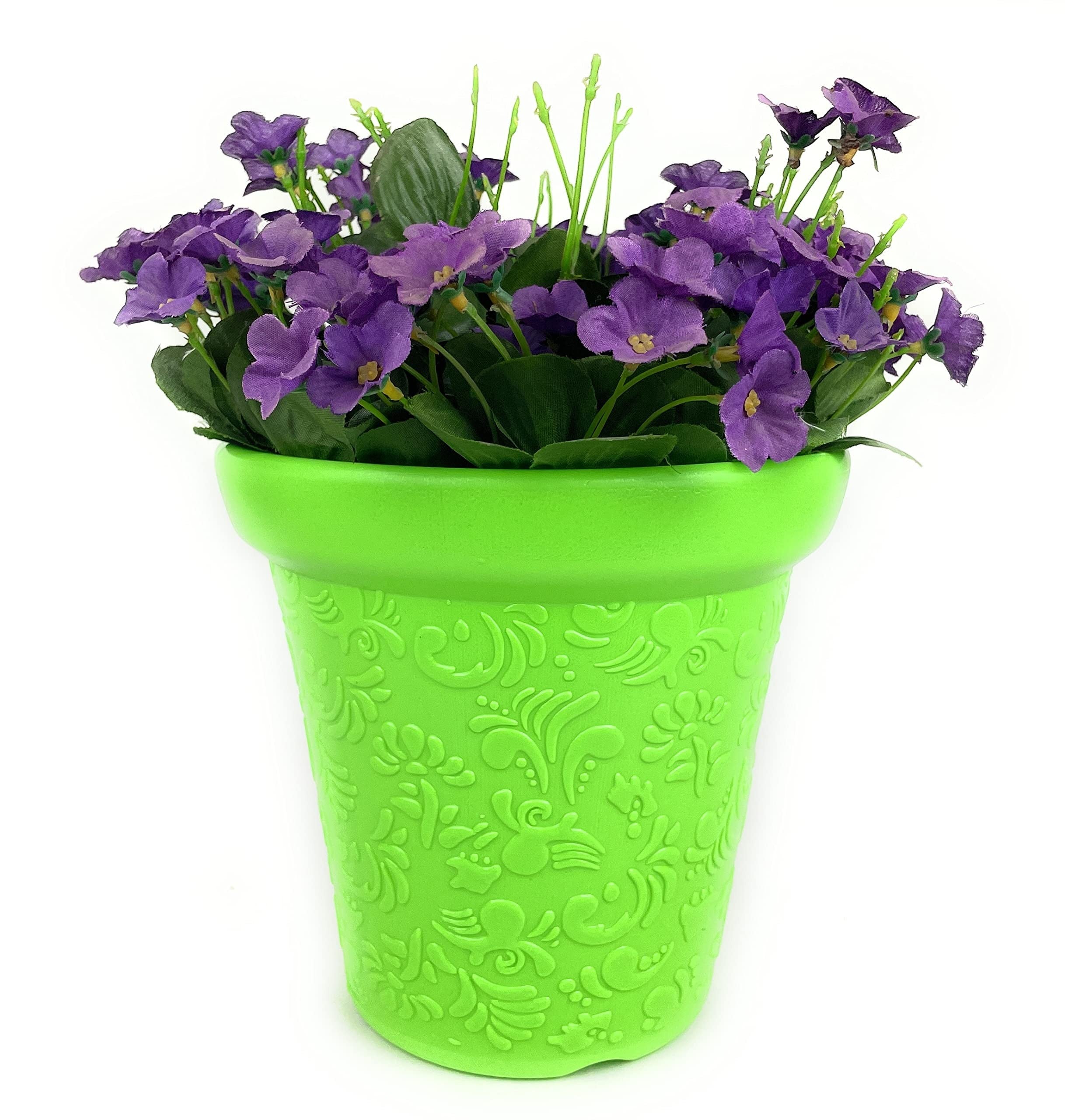 GoHooked lime green plastic planter pot with embossed floral design, filled with purple artificial flowers.
