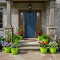 GoHooked 8 Pack lime green plastic decorative planter pots with vertical ribbing, holding various plants on a stone porch.