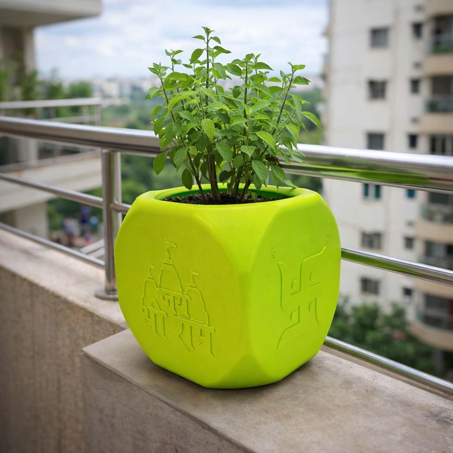 GoHooked lime green plastic Tulsi pot with Hindu symbols, perfect for home or pooja room.