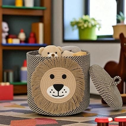GoHooked cotton rope storage basket with a playful lion face design and removable lid in a child's playroom.