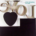 GoHooked white plastic LOVE word collage photo frame with heart shape for 3 photos. Romantic wall decor.