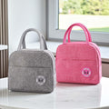 Go Hooked pack of 2 grey and pink Oxford cloth lunch bags with handles and zipper closure. Reusable thermal tote.