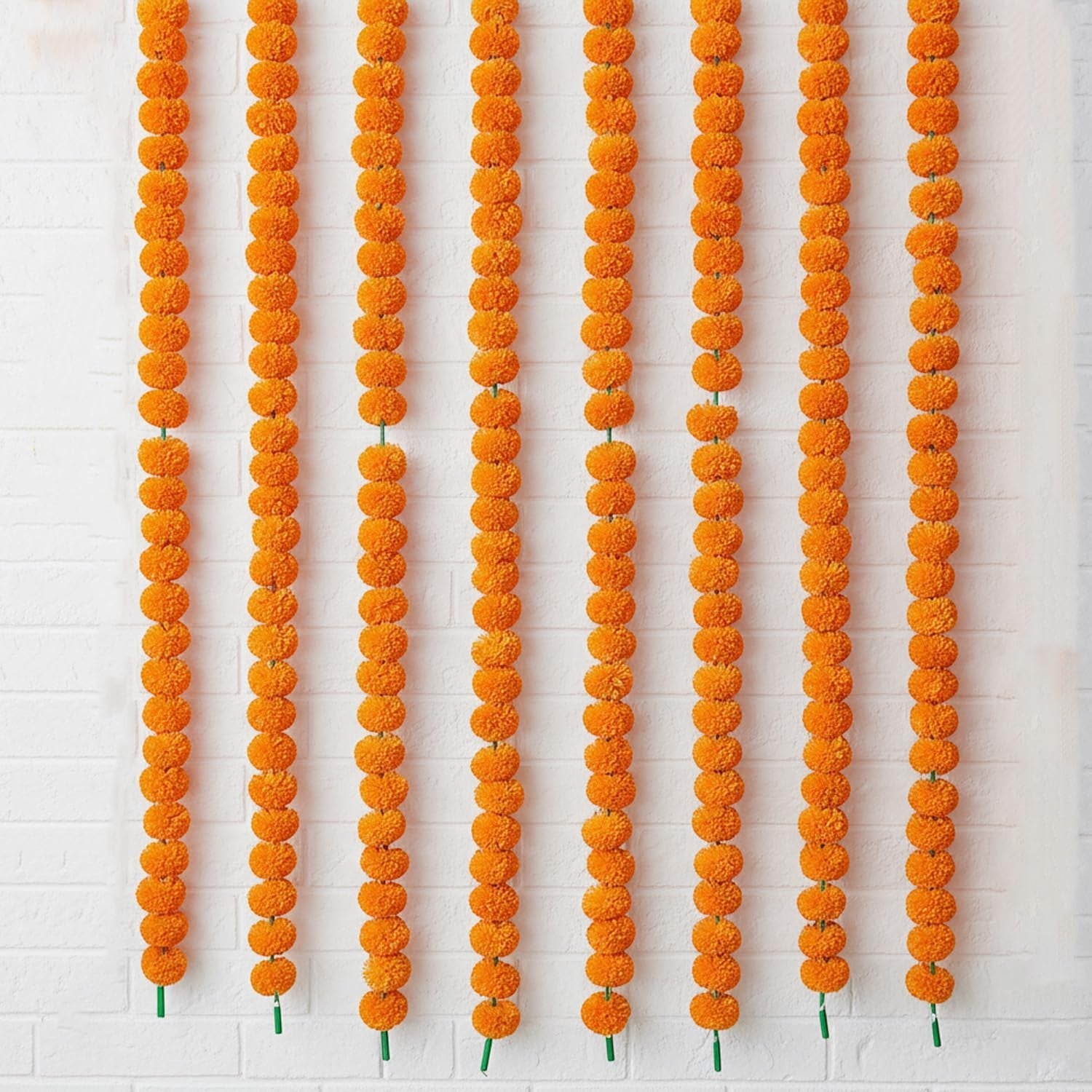 GoHooked set of 8 orange marigold flower garlands, 4.5 ft each, made of fibre for festive and home decor.