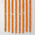 GoHooked Set of 8 orange marigold flower garlands, 4.5 ft each, made of fibre for festive decor.