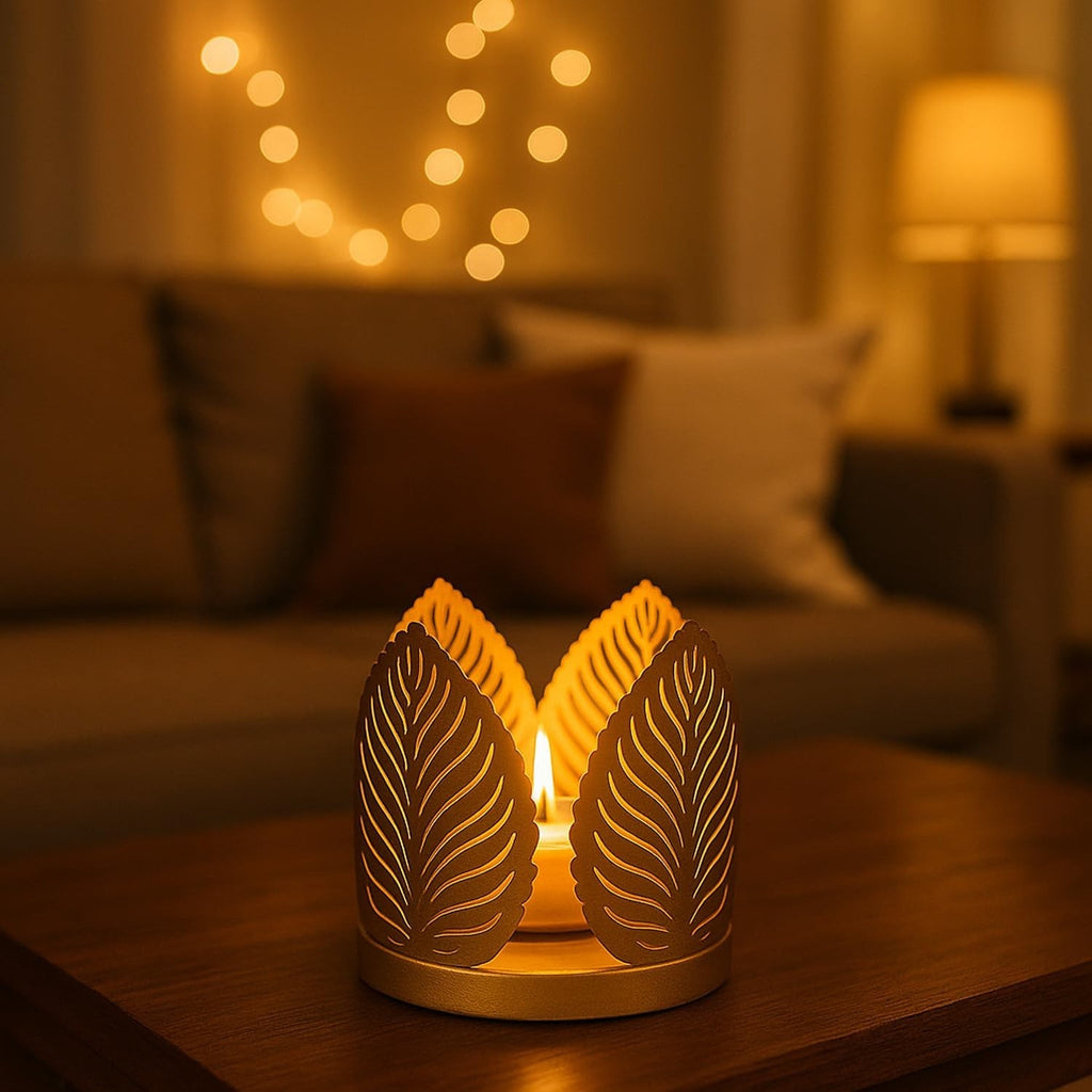 Go Hooked matte gold metal tealight holder with leaf cut design, set of 2, ideal for Diwali decor.