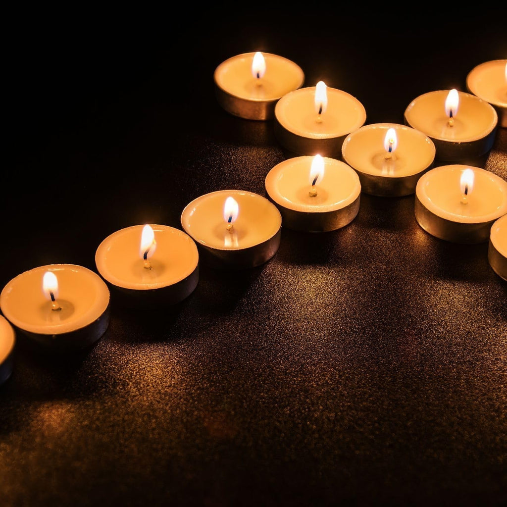 GoHooked matte gold finish pedestal stand set of 2 with tealight candles, ideal for Diwali and home decor.