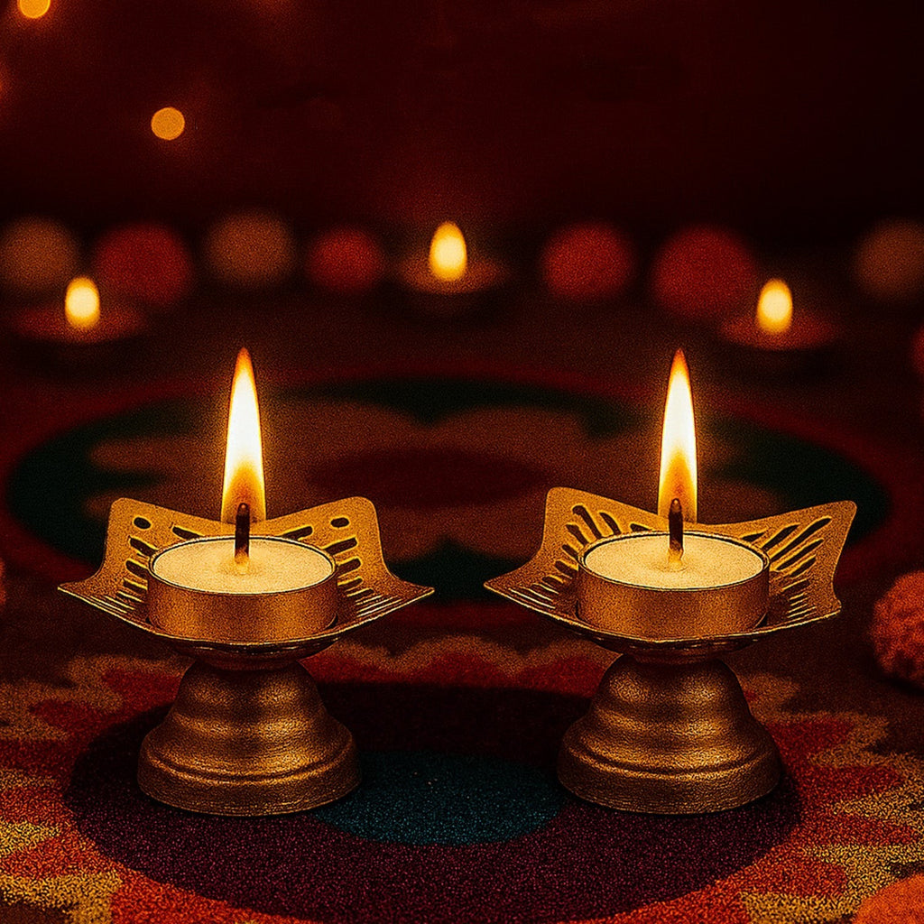 GoHooked matte gold metal tealight candle holders with floral cutouts, set of 2, for Diwali decor.