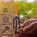 Go Hooked heavy-duty metal garden fork with orange and black ergonomic handle. Rust-resistant for digging, weeding, and soil aeration.