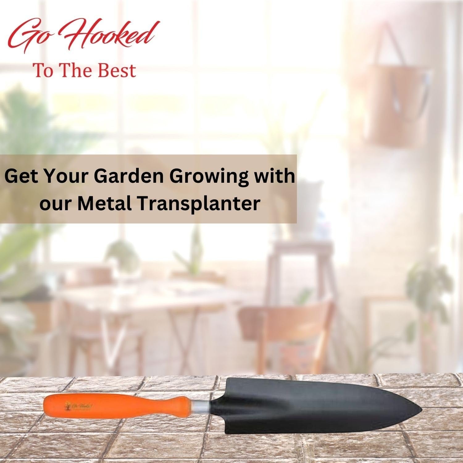 GoHooked orange and black metal garden transplanter with ergonomic handle for precision planting.