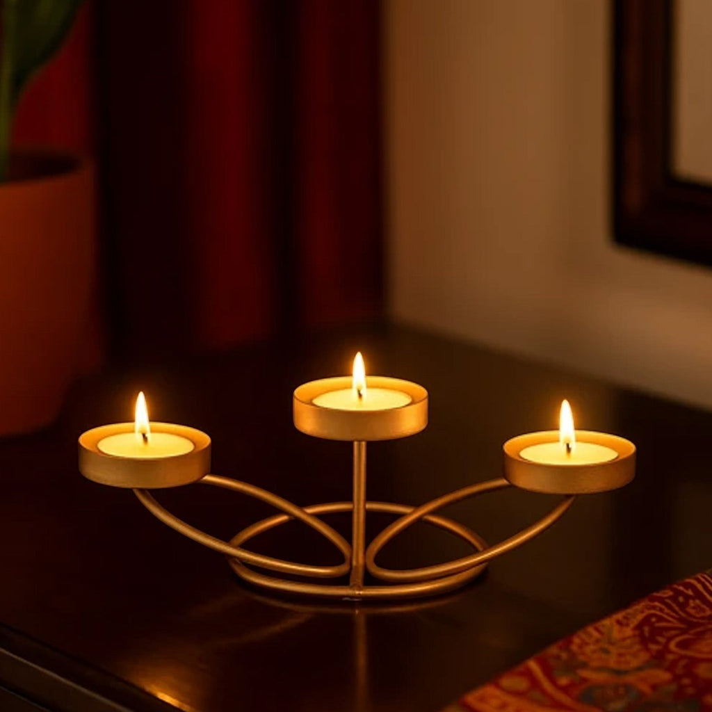 Go Hooked matte gold metal 3-slot tealight candle holder, 25cm decorative iron stand for home decor.