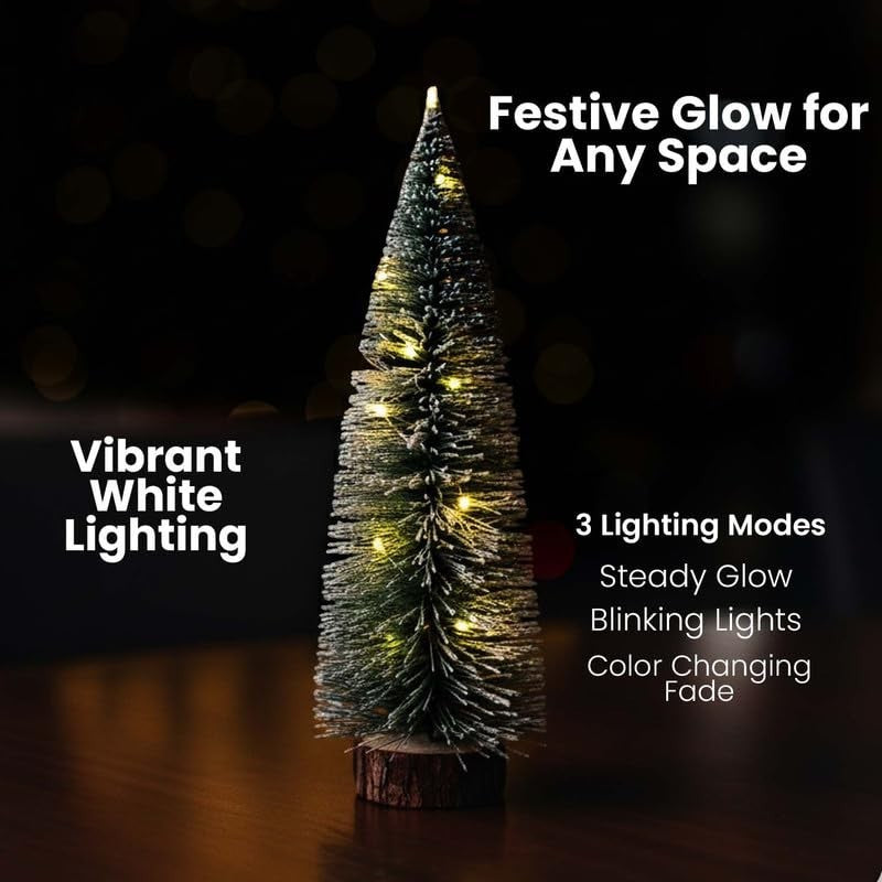 GoHooked green mini Christmas tree with vibrant white LED lights and a wooden-style base. Festive tabletop decoration.