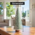 GoHooked green mini Christmas tree with LED lights and wooden base, 26 cm tall.